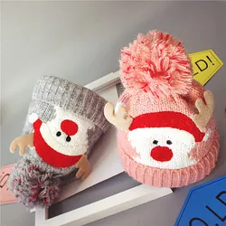 Détails de bonnets de Noël tricotés pour enfants en gris et rose avec de grands pompons