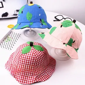 Detailed view of kids cotton sun hats with 3D leaf tops and adjustable wind straps