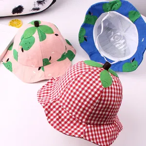 Kids plaid bucket hats with 3D leaf tops and cartoon prints featuring adjustable straps