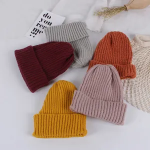 Winter knit baby beanie set with cute dog patch and double pompoms in five soft colors