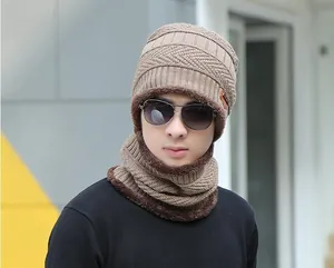 Close-up of khaki winter knit hat and neck warmer set with thick faux fur lining