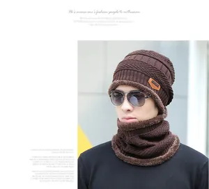 Detail of winter knit beanie and neck warmer set with thick fleece lining for men