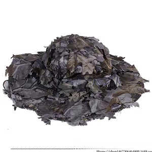 Detail of 3D leaf camouflage pattern on Ghillie hunting hat for outdoor concealment