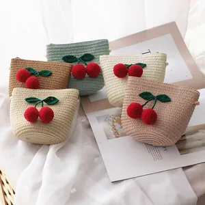 Miniature handmade woven straw crossbody bags with 3D crochet cherry decor for girls