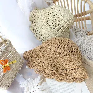Kids crochet straw sun hats in beige and light coffee colors with wavy brim for summer beach