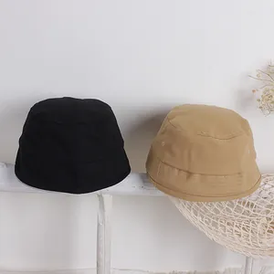 Cappelli alla pescatora in tela tinta unita per bambini in nero e kaki per l'aria aperta