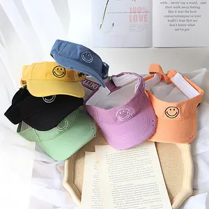 Kids open top sun visors with smiley face embroidery in various vibrant colors