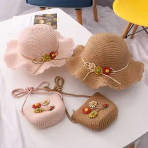 Summer kids straw sun hat and matching floral bag set for outdoor travel in pink and beige