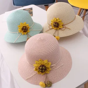 Three colorful sunflower straw hats for girls in mint green, beige, and pink colors