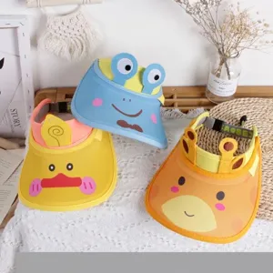 Detail of adjustable straps on cartoon animal sun visors in blue and yellow colors