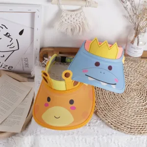 Close-up of kids cartoon giraffe and dinosaur sun visors with soft adjustable straps