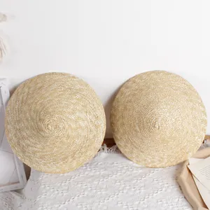 Set of two breathable woven straw sun hats for babies with flat brim in beige color