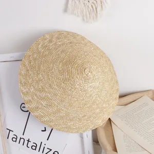 Breathable pointed straw sun hat for children with a wide brim and spiral woven texture