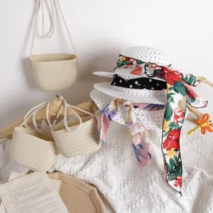 Straw sun hat and matching bag set for kids with floral ribbons and woven texture