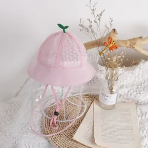 Pink breathable mesh baby sun hat with clear face shield and green sprout ornament