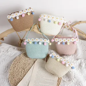 Handmade straw crossbody bags with daisy lace and colorful pom-poms for girls