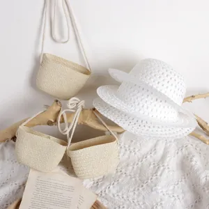 Straw sun hats and crossbody bags for children with floral lace and rural style detail