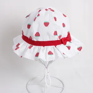 Sweet strawberry print cotton sun hat for girls with bow and wavy brim detailing