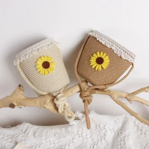 Borse a secchiello in paglia per bambina con girasole e pizzo nei colori beige e marrone