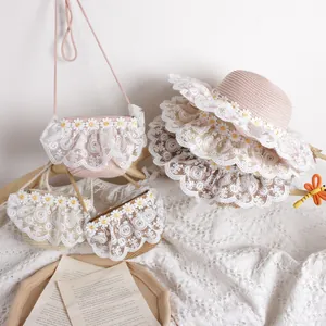 Ensemble chapeau de paille pour enfants avec dentelle marguerite et sac tissé assorti