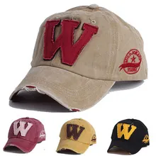 Detail view of cotton baseball caps with W embroidery and vintage distressed brims