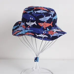 Navy blue kids sun hat with cartoon shark print and adjustable chin strap