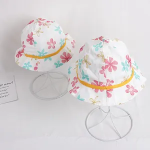 Chapeaux de soleil en coton pour bébés avec motif floral et bord ondulé pour l'été
