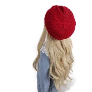Chic red knitted wool beret for kids with vertical ribbed pattern and warm texture