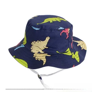 Close-up of kids dinosaur bucket hat with adjustable windproof drawstring and prints