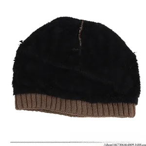 Detail of the thick fleece lining and ribbed knit cuff on this men's winter warm hat