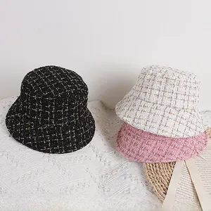 Three-piece set of kids tweed bucket hats in black, cream and pink with metallic silver threads