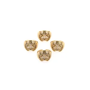Set of four 18K gold plated tiger head rings with sparkling zircons and black enamel details