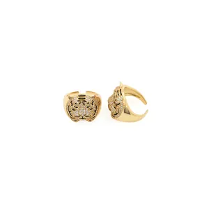 Macro shot of 18K gold plated tiger ring with white zircon pave setting and adjustable band