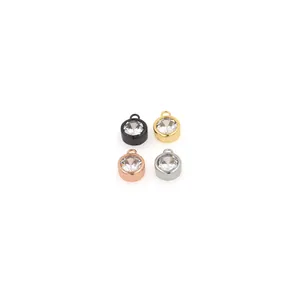 Set of four 18K gold plated round zircon pendants in black, gold, rose gold and silver