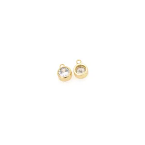 Detail of 18K gold plated round charms with sparkling cubic zirconia and closed loops