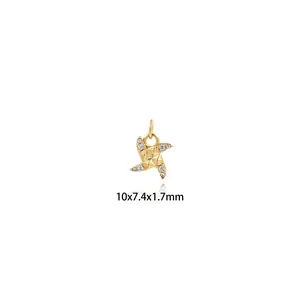 Detailed view of 18K gold-plated windmill pendant with zircons and size specifications