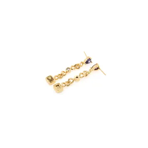 Detailed view of 18K gold-plated drop earrings featuring purple and yellow gemstones