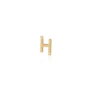 Detailed macro view of 18K gold plated letter H connector for DIY jewelry making
