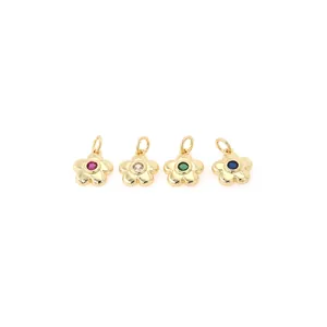 Detail of 18K gold-plated flower pendants with colorful cubic zirconia inlays for DIY