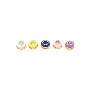 Detailed view of five 18K gold plated bead connectors with colorful enamel and zircon stones