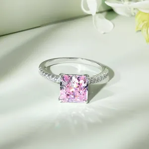 Macro detail of S925 silver ring featuring a square pink diamond and micro-pave setting