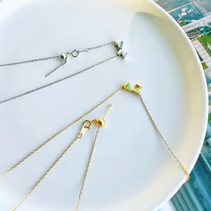 Detail of adjustable S925 sterling silver heart necklaces with letter pendants and needle clasps