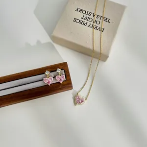 Detailed view of S925 silver heart jewelry set with pink cubic zirconia in a gift box