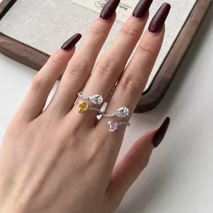 S925 sterling silver bypass ring featuring heart and pear cut high carbon diamonds