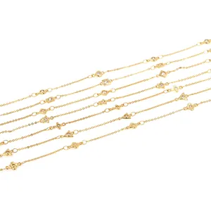 Catena in rame placcato oro 18K con ciondoli in zircone a forma di stelle e fiori