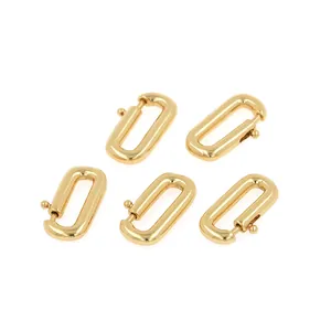 Close-up of five 18K gold-plated oval spring clasps for DIY jewelry making and necklaces