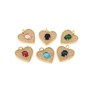 Detail of 18K gold plated heart pendants with micro-pave cubic zirconia and colorful gemstones