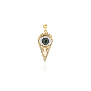 Detailed macro view of 18K gold plated evil eye pendant with micro-set zircon accents
