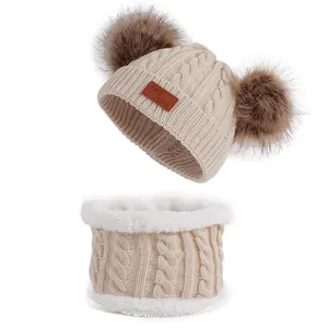 Winter kids knit hat and scarf set with double fur pom-poms and warm fleece lining