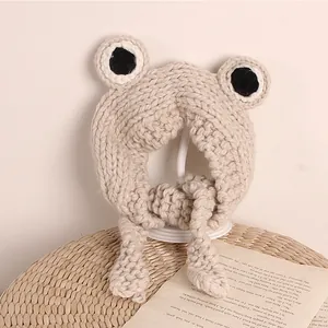 Handmade crochet frog style knit hat for kids with large eyes and ear flaps in beige
